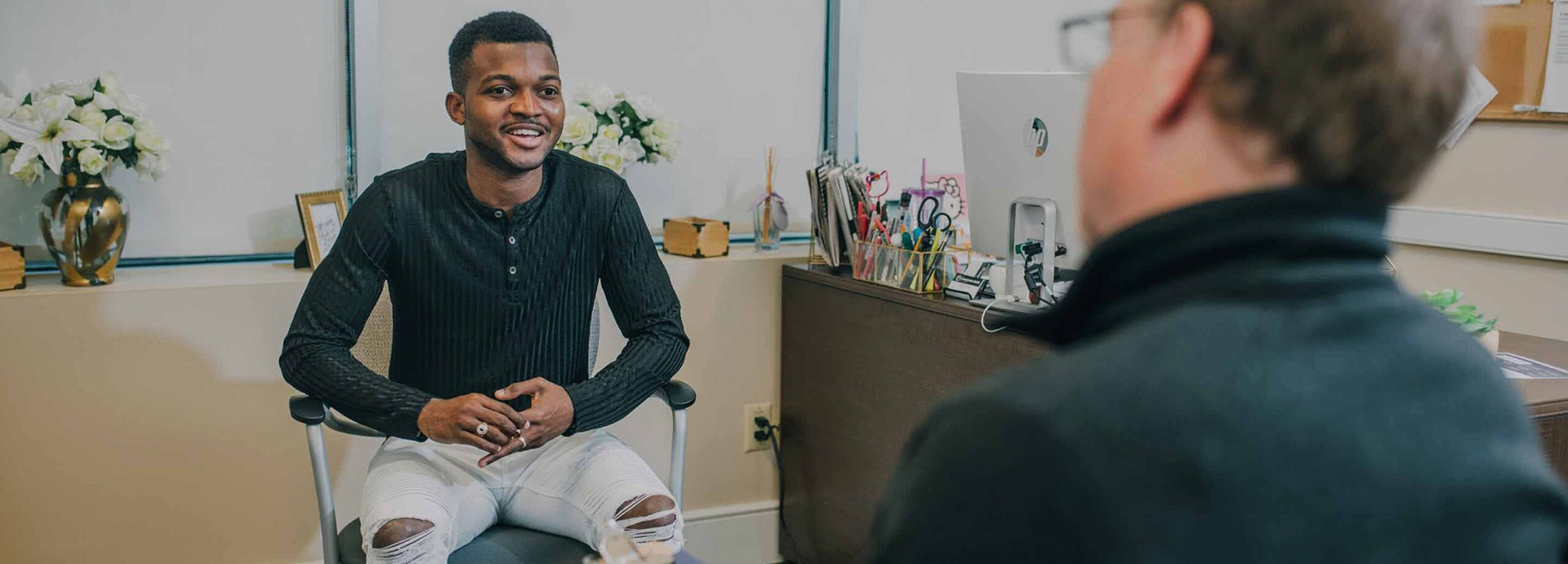 A Man Engaging in conversation at The Counseling Center Freehold